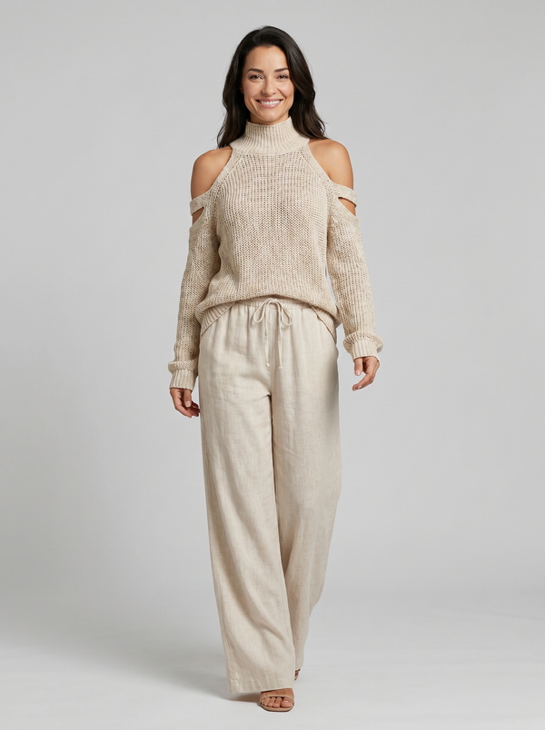 Conjunto de top de cuello tortuga en punto beige con hombros al descubierto y pantalones de pierna ancha